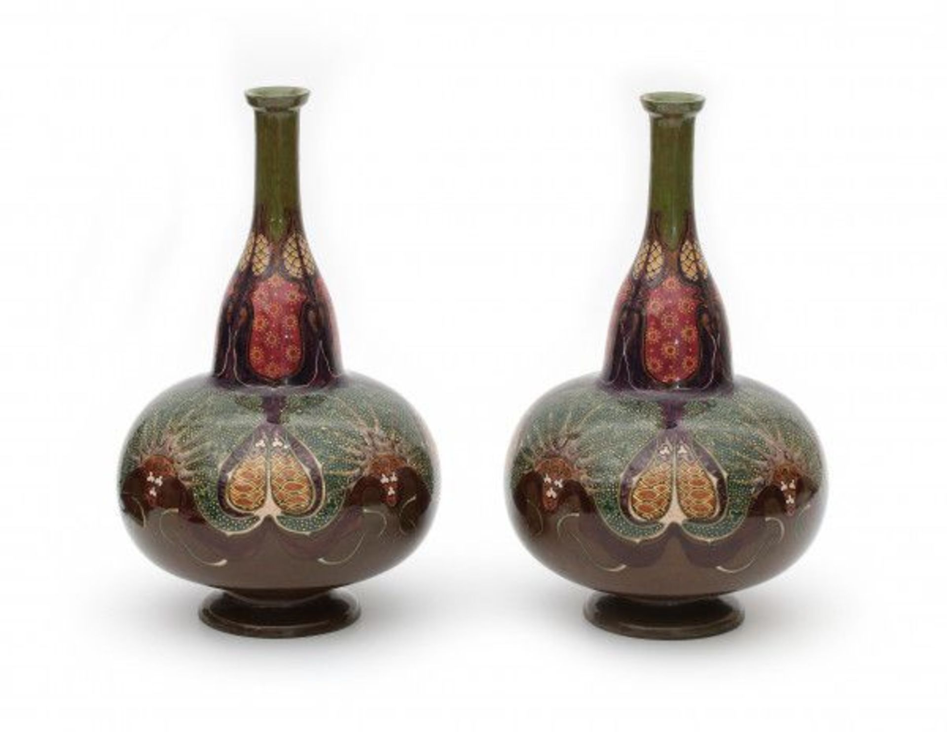 N.V. Haagsche Plateelfabriek Rozenburg, Den Haag (1883-1917)A pair of flask-shaped ceramic vases