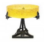 André Delatte (1887-1953)A yellow mottled glass fruit bowl on wrought iron base, the bowl signed: