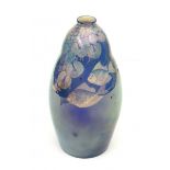 Christiaan Johannes Lanooy (1881-1948)A lustre glazed ceramic vase, decorated with fishes on a blue