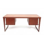 Kai Kristiansen (1929)A teak partnerdesk with two drawer compartments and cupboard doors to the