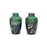 N.V. Haagsche Plateelfabriek Rozenburg, Den Haag (1883-1917)Two ceramic vases decorated with