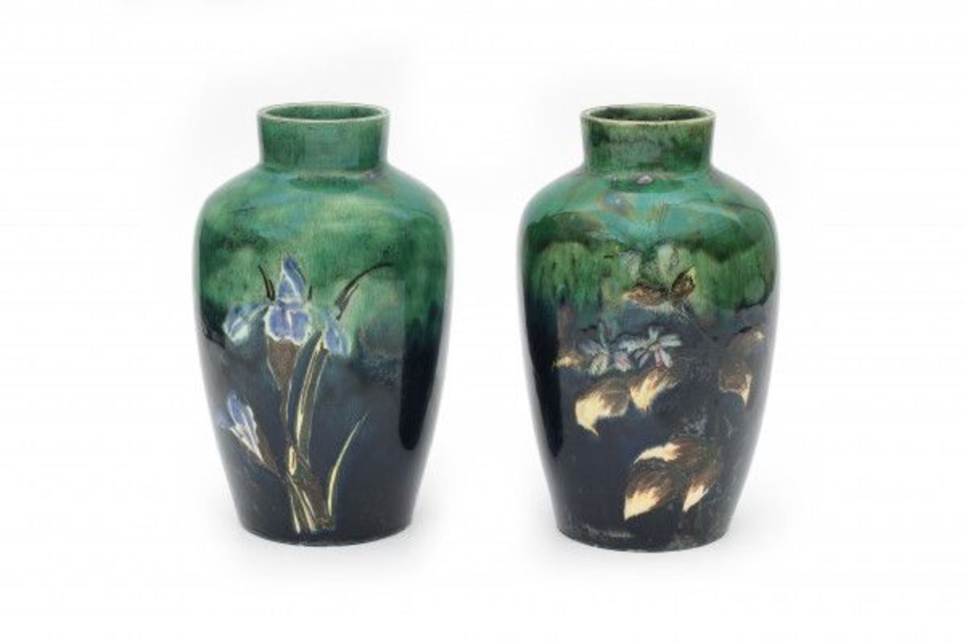 N.V. Haagsche Plateelfabriek Rozenburg, Den Haag (1883-1917)Two ceramic vases decorated with