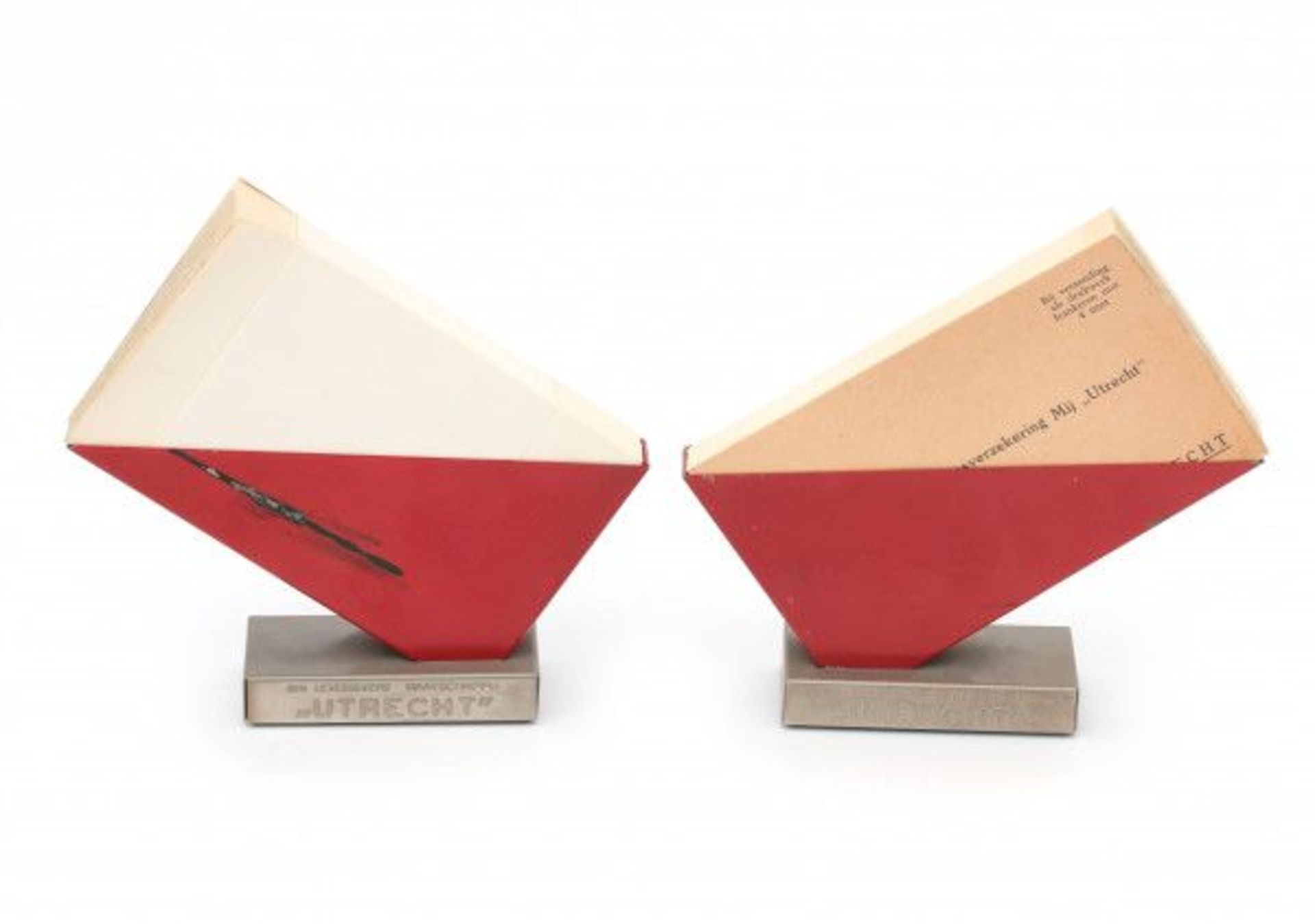 Wim Rietveld (1924-1985), attributedTwo red lacquered and chromium plated metal desk stands with