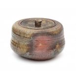 Pascal Geoffroy (1951)A red clay ceramic lidded jar, partly with grey/green glaze, marked with