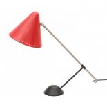 Floris FiedeldijA nickle-plated, red and black lacquered metal desk lamp, adjustable in height,