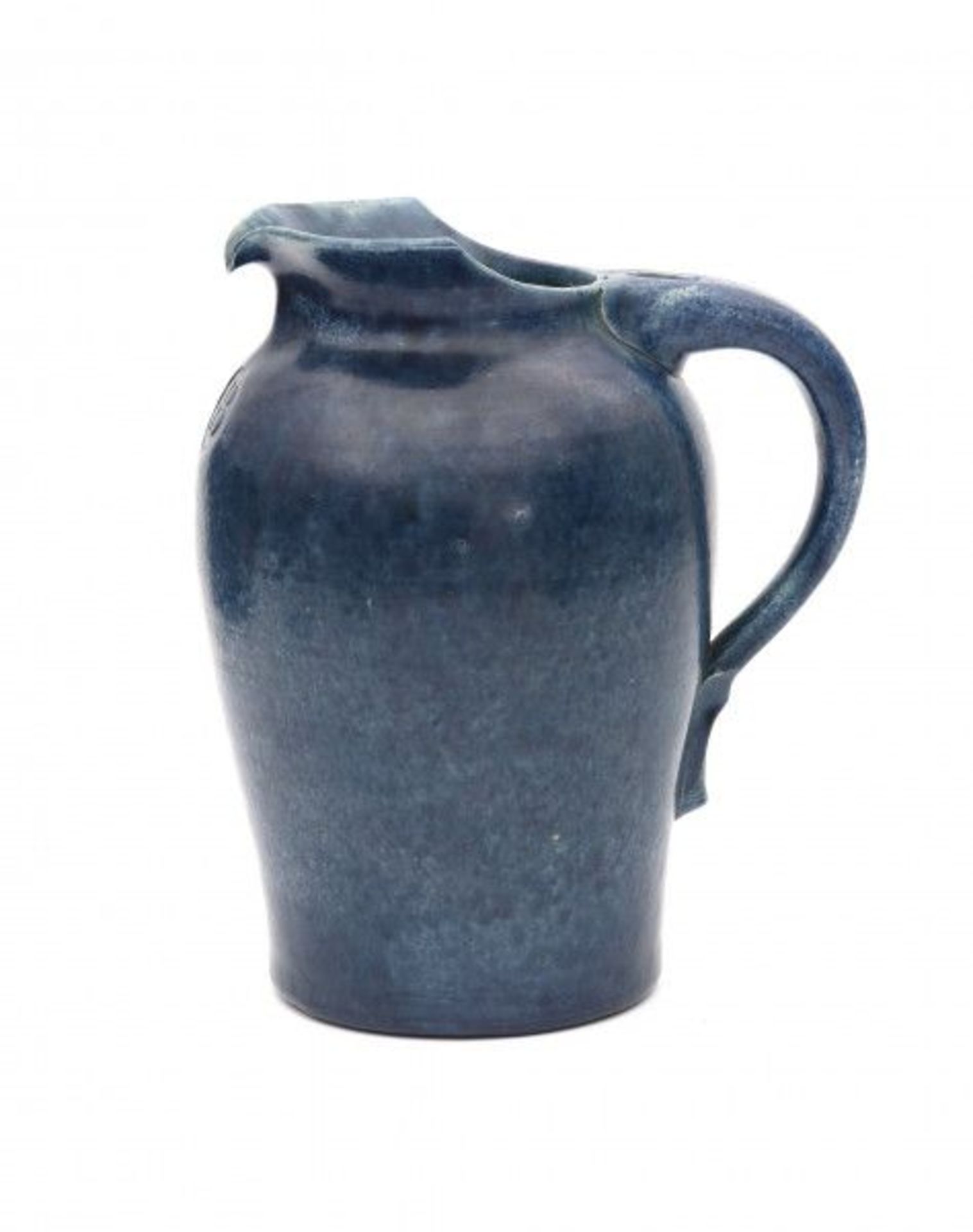 Willem Coenraad Brouwer (1877-1933)A ceramic blue glazed pitcher with incised flower-shaped