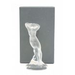 Lalique FranceA clear and frosted crystal figure of a dancing female nude, the arms above her head,