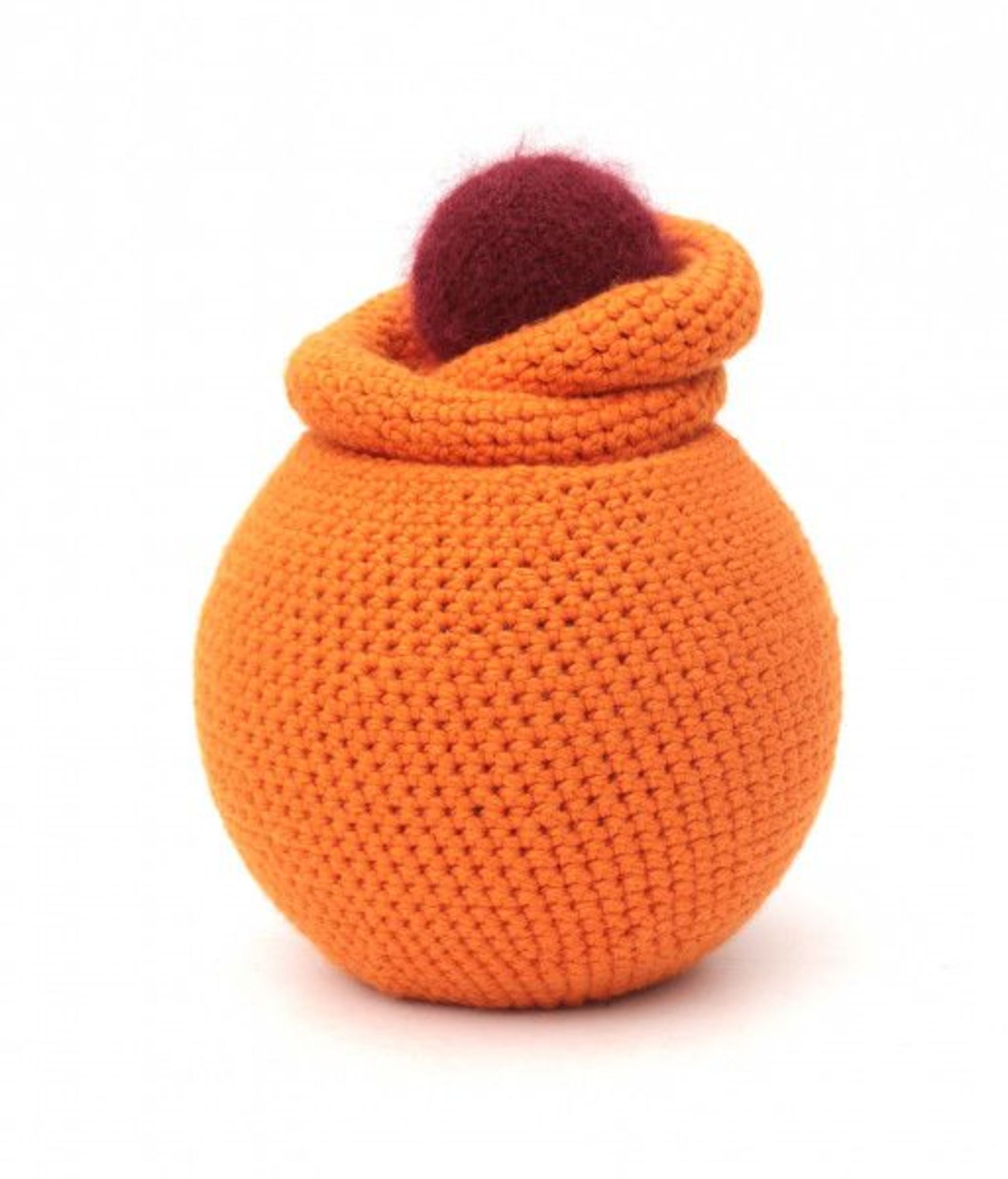 Mia van der Burg (1951)A glass vase with knitted orange woollen exterior and dark red ball, 2012,