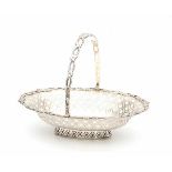 An oval English silver basket. Maker's mark W. Hutton & Sons Ltd. Hallmarked Sheffield. Year