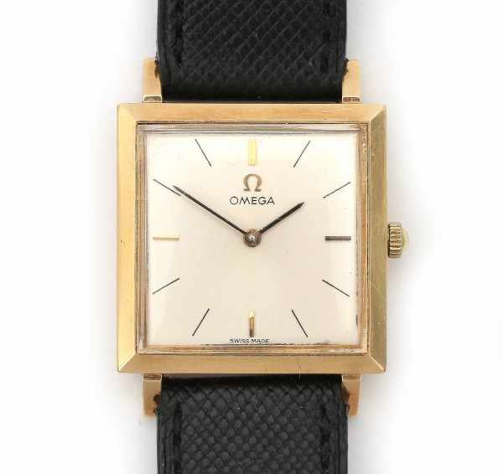 A 18 carat yellow gold square wrist watch from the 1960's - 1970's. Manual winding hour. Omega,