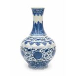 A Chinese blue and white Ming style lotus vase. Marked with an apocryhal six character Guangxu mark,