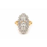 18 carat gold navette shaped ring set with brilliant cut diamonds. Total ca. 0.70 ct. Yellow gold