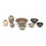 A collection of Chinese provincial ceramics, five bowls and three vases. With varying glazes