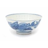 À Chinese blue and white bowl, decorated with silkworms and a poem. With a six character mark,