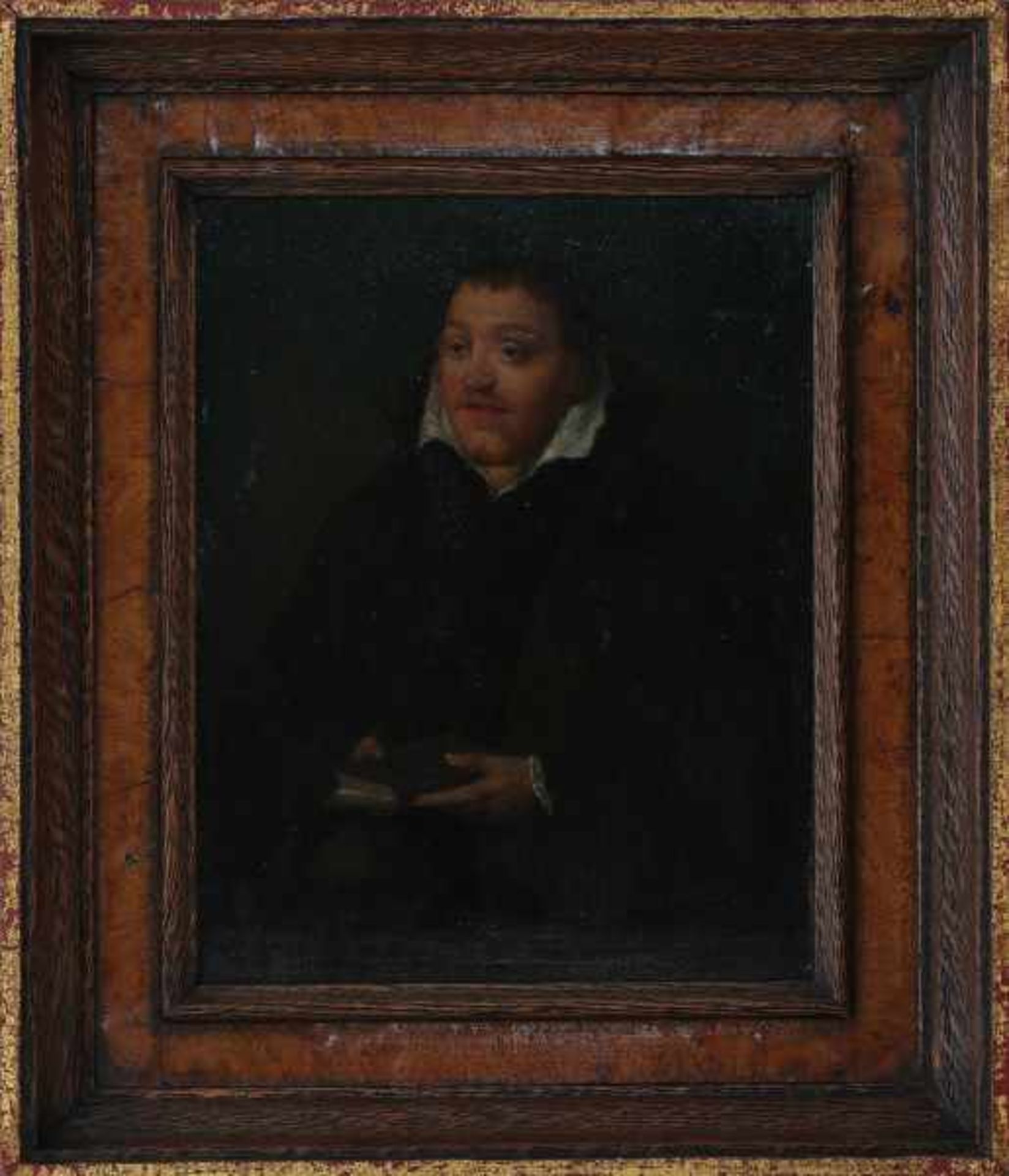 In the manner of Hans Holbein IIPortrait of a man with book and skull. Not signed.panel 20 x 15 cm.-