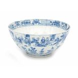 A Chinese blue and white moulded lotus bowl, decorated with a rim of scenes with various figures