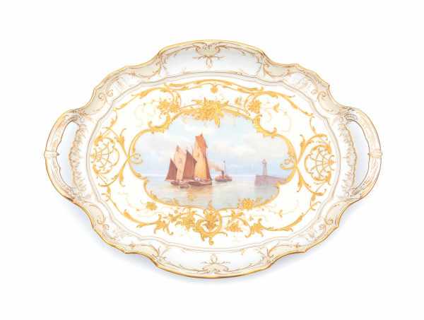 A porcelain serving tray, decorated with fishing boats leaving the harbour and highlighted with gold