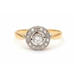 18 carat yellow gold cluster ring set with diamonds in platinum. In the center an old brilliant