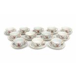 A set of twelve cup and saucers, decorated with a variety of flowers. MeissenDiameter 14 cm.- - -