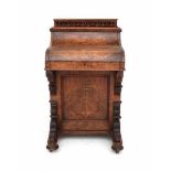 A burrwood 'Davenport' writing desk. 19th century. The mechanism out of order.Dimensions 95 x 57 x