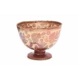 A Hispano-Moresque footed bowl. 17th/18th century. With luster glaze decoration.height 16,5