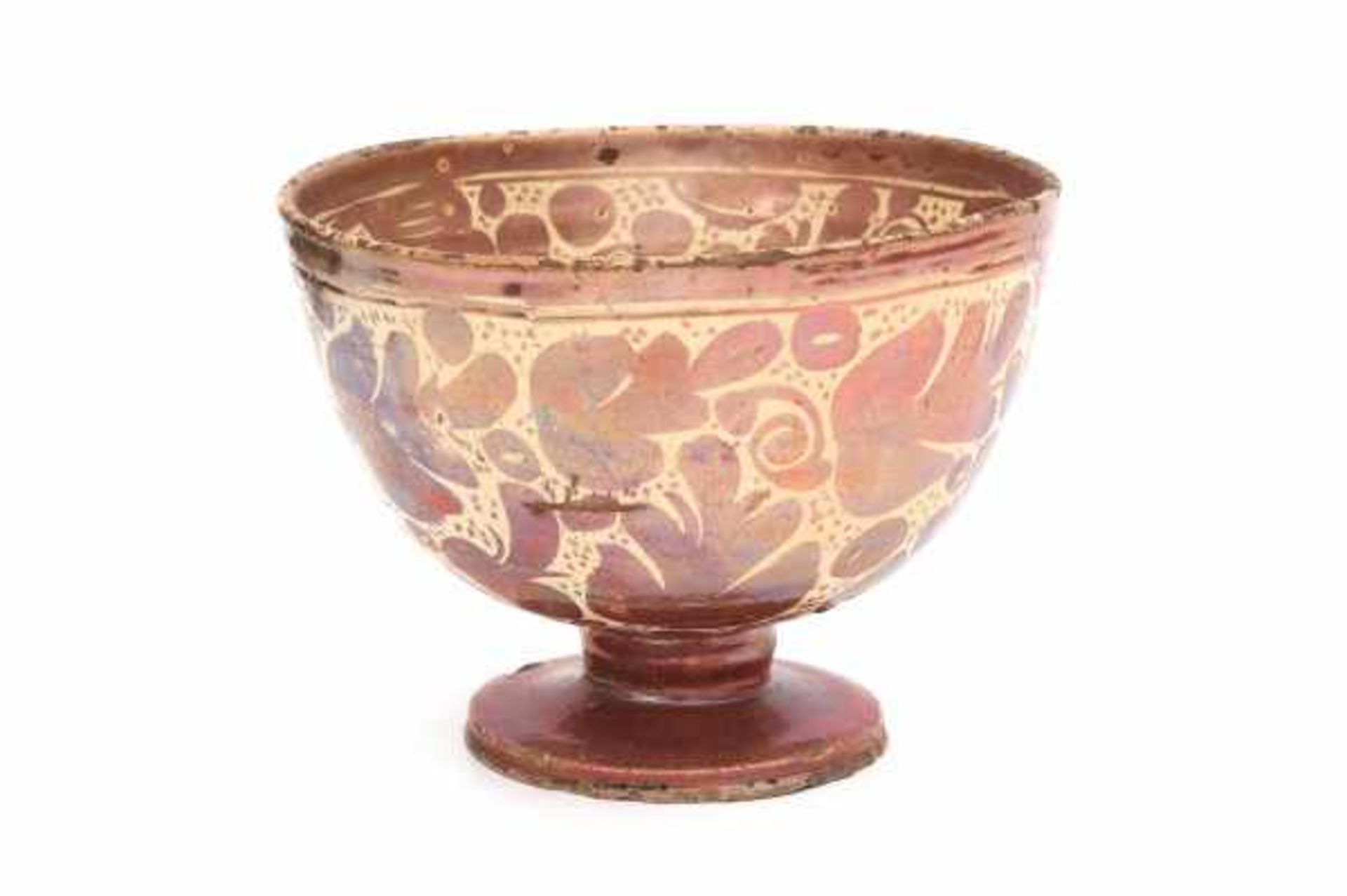 A Hispano-Moresque footed bowl. 17th/18th century. With luster glaze decoration.height 16,5