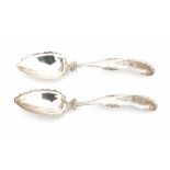 A pair of Dutch silver serving spoons. Maker's mark Wed. Gerardus Wilheminus Uriot, Amsterdam.