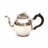 A Dutch Sterling silver teapot. Maker's mark Pieter Pieterse, Amsterdam and A. Bonebakker & Zoon,