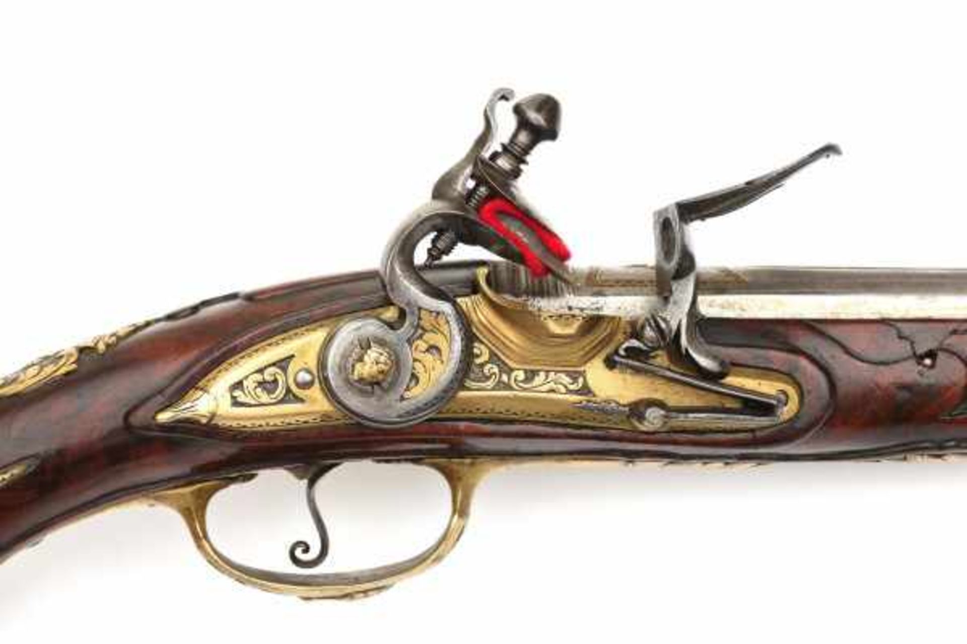 An Italian flintlock pistol, the walnut stock enriched with engraved brass mount. The barrel - Bild 2 aus 7