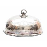 A silver plated cloche, with pearl rim. The handle in the shape of an intertwined snake. With