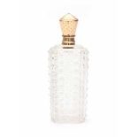 A crystal perfume bottle with a 14 carat rose gold cap in original leather case from the 19th