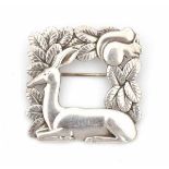 A sterling silver square shaped brooch with deer and squirrel made post 1945, by George Jensen,