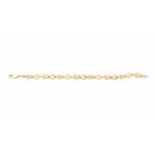 A 14 carat yellow gold beach themed link bracelet. Length ca. 20 cm. Gross weight ca. 8.6 grams.