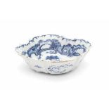 A Dutch Delftware bowl. 18th century. Marked VH. Possibly the initials of Johannes Verhagen.