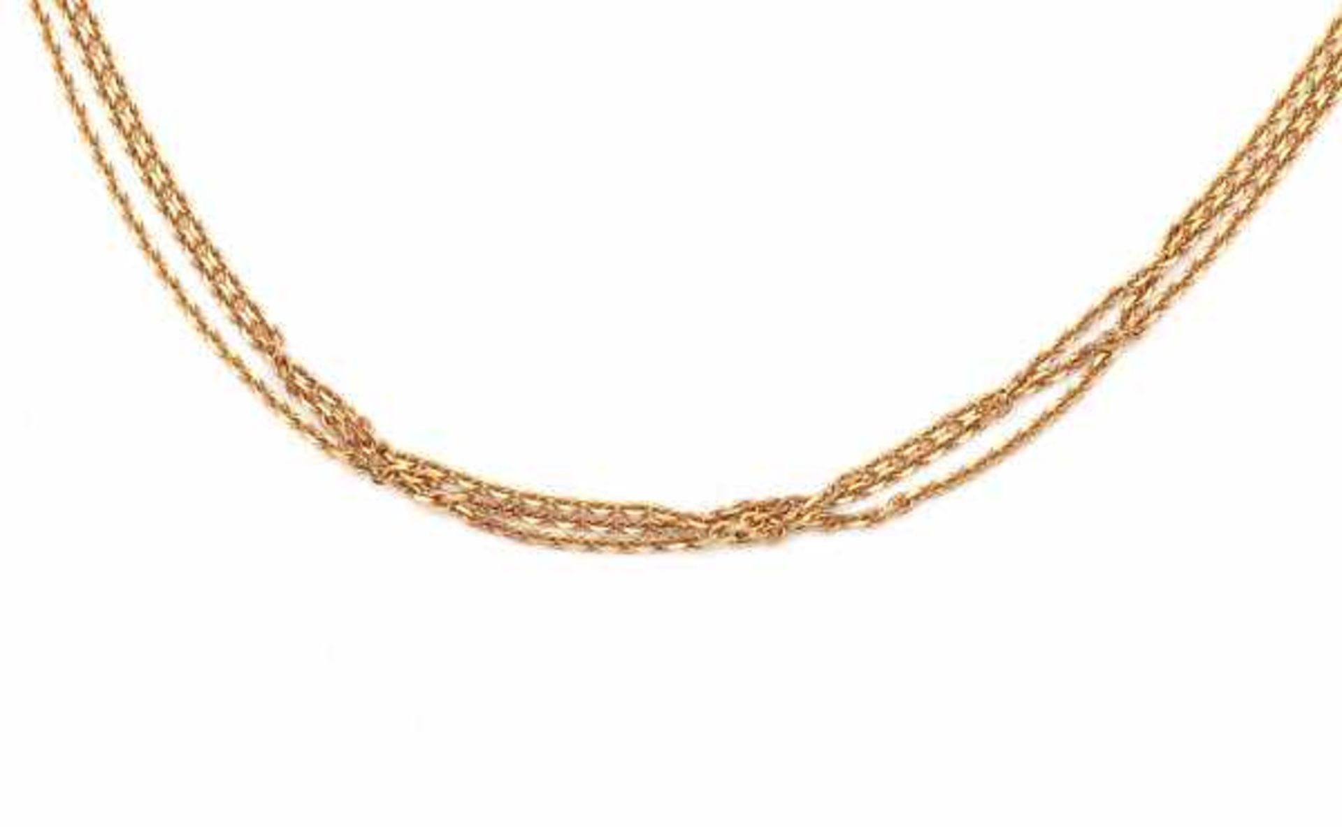 An 18 carat yellow gold three strand anchor type link chain necklace by Chopard. Length ca. 45 cm.