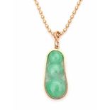 A 14 krt rose gold necklace on a ball chain with pendant of carved jade in the shape of a bean pod