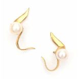 A pair of yellow gold earrings by Paloma Picasso for Tiffany & Co, 1983. Set with cultured pearls