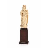 A French ivory sculpture, Mary with child. 17th centuryheight incl. base 10,5 cm.- - -29.00 %