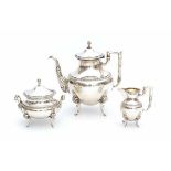 A German three-piece silver tea service. Maker's mark Bruckmann & Söhne, Heilbronn.Weight: 1440