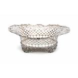 A Dutch silver basket. Ca. 1900. Marked for Friesland and with pseudo antique hallmarks.Length 21