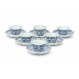 A set of six Chinese blue and white cup and saucers, decorated with flowers. Kangxi (1662-1722)