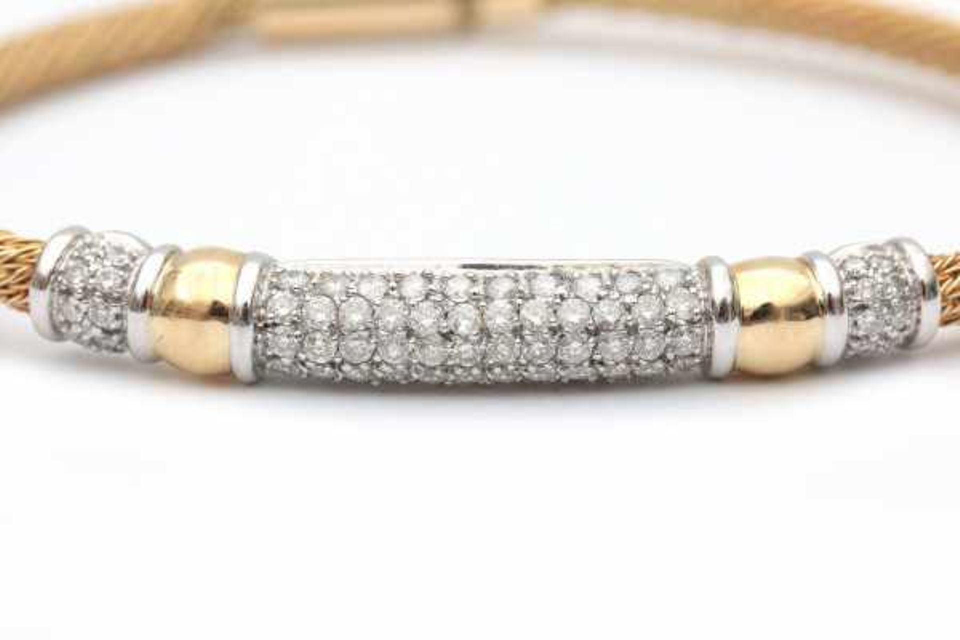 A yellow and white gold braided bracelet, its center is set with pavé cut diamonds, total ca. 0.51 - Bild 2 aus 2