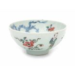 A Chinese famille rose bowl, the outside decorated with elegant ladies and flowers, the inside