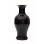 A Chinese monochromed mirror black vase. 18th century.height 42 cm.- - -29.00 % buyer's premium on