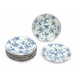 A set of ten Chinese blue and white plates, decorated with flowers. Qianlong period (1736-1795).