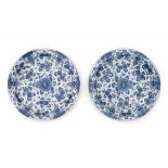 A pair of Delftware blue and white chargers, decorated with a floral pattern. 18th centuryDiameter