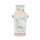 A Chinese octagonal famille rose vase, one side decorated with a mountainous landscape, the other