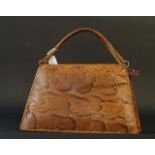 Python handbag, wear and tear, dim. 37 x 25 cm. 27.00 % buyer's premium on the hammer price, VAT