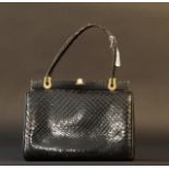 Snakeskin handbag, wear and tear, dim. 26 x 20 cm. 27.00 % buyer's premium on the hammer price, VAT