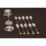 10 Dutch silver coffee spoons, second amount + Dutch silver candlestick, second amount, bent +